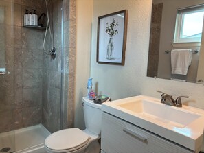 Hair dryer, towels, soap, shampoo