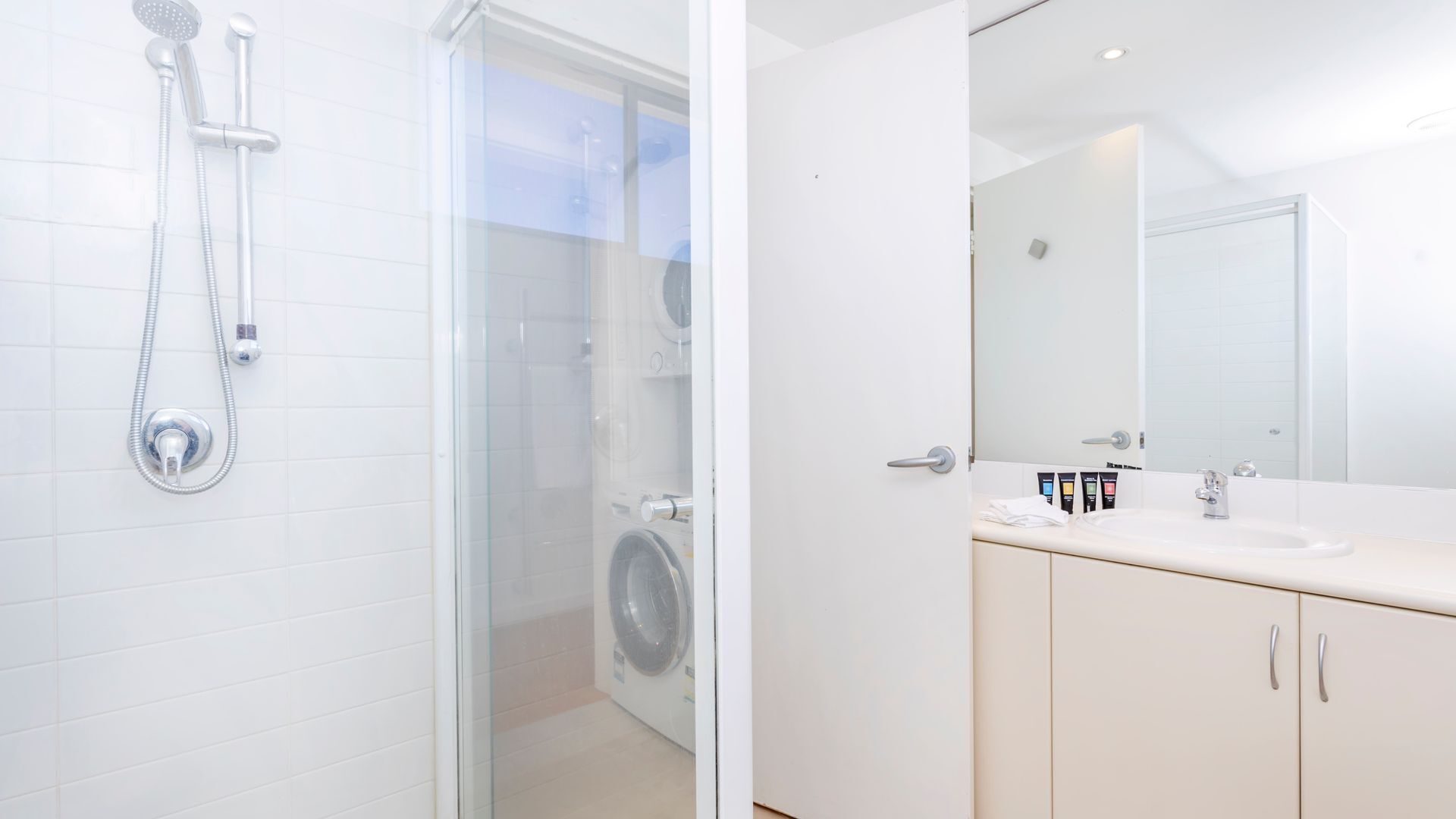 Shower, hair dryer, towels