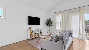 Deluxe Apartment, Balcony | Living area