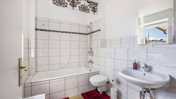 Shower, free toiletries, hair dryer, towels