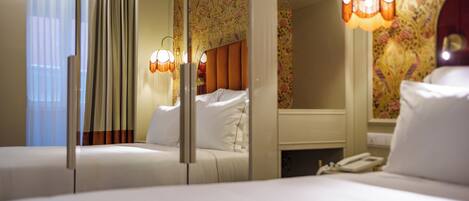 Caja fuerte, cortinas opacas, sistema de insonorización y wifi gratis