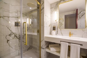 Shower, hair dryer, slippers, towels