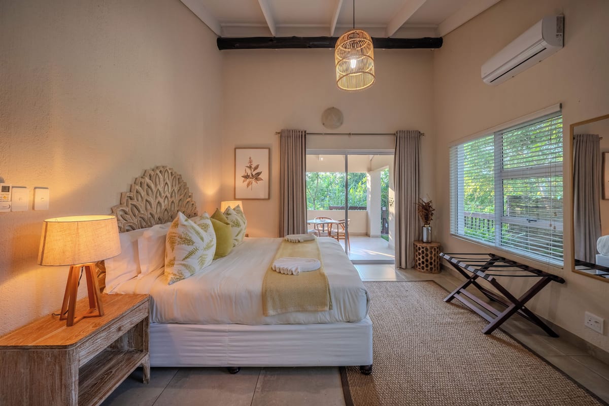 Executive Suite, Balcony, Garden View | In-room safe, iron/ironing board, free WiFi