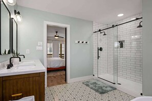 Shower, hair dryer, towels, shampoo