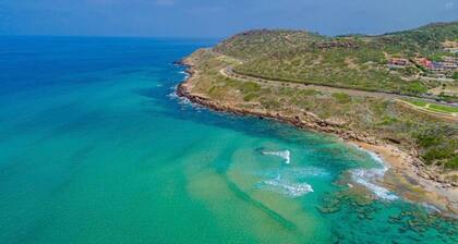 Residenza Le Farfalle 'A' with Garden View, Wi-Fi and Air Conditioning