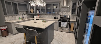 Cozy 2-bedroom apartment with movie theater.