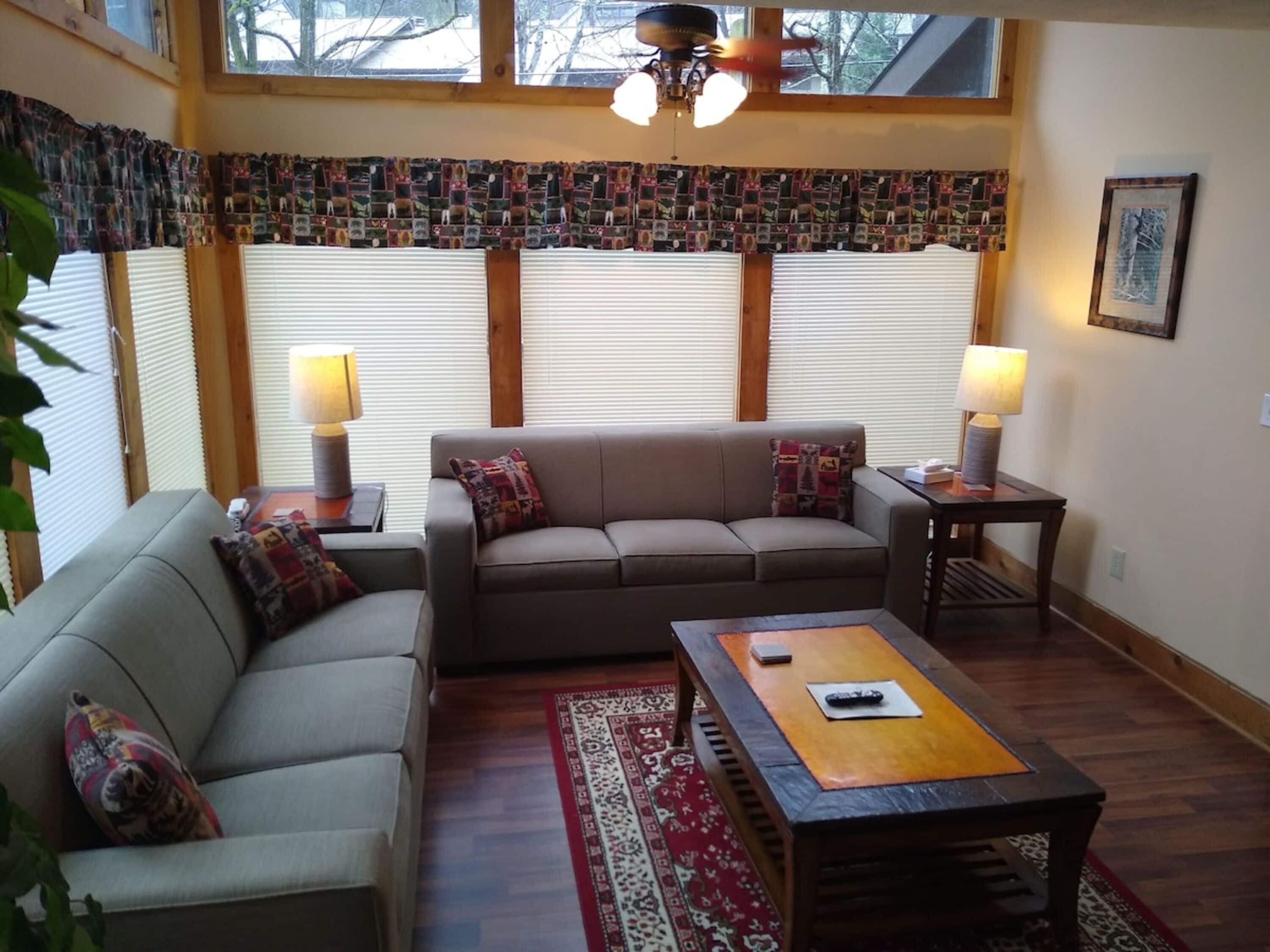 Family House, 2 Bedrooms, Patio, Mountainside | Living room | 35-inch Smart TV with satellite channels, fireplace, books