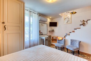 2 dormitorios, tabla de planchar con plancha, wifi y ropa de cama