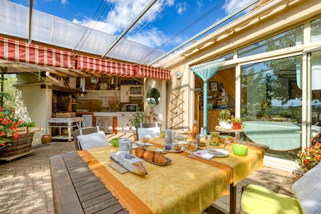 Outdoor dining. 'Petite Suite Douillette' Guest Room with Balcony, Wi-Fi, and Air Conditioning