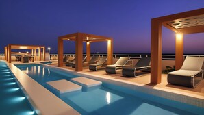 A poolside area with lounge chairs and a pool. - Nile Cruise Adventure, every Monday from Aswan 3 nights and every Thursday from Luxor 4 nights (Aswan)
