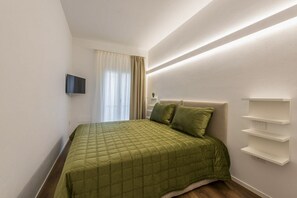 4 chambres, fer et planche à repasser, accès à Internet, literie fournie