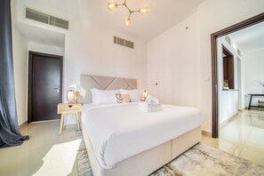 1 غرفة نوم ومكواة/لوح كي وخدمة الإنترنت وملاءات أسرّة