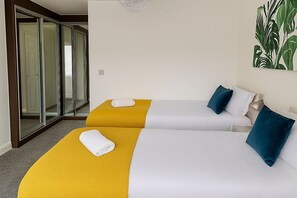 1 bedroom, desk, iron/ironing board, travel cot