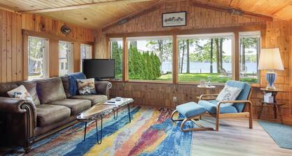 Long Lake Stone Cottage in Traverse City Frontage Kayaks Fire pit Pet friendly