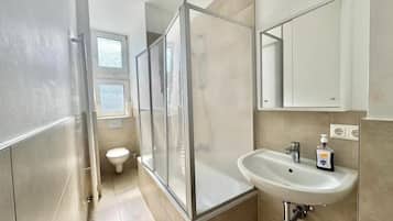 Shower, towels, soap, shampoo