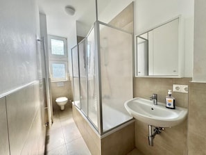 Shower, towels, soap, shampoo