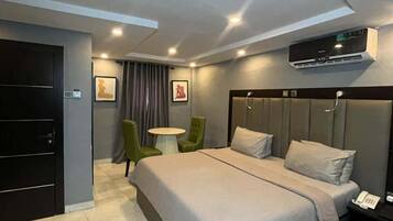 Economy Room, Balcony, City View | Desk, laptop workspace, blackout drapes, soundproofing