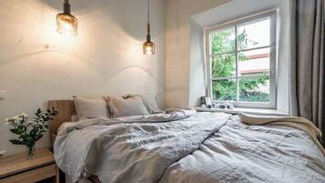 2 slaapkamers, een strijkplank/strijkijzer, reisbedje, wifi