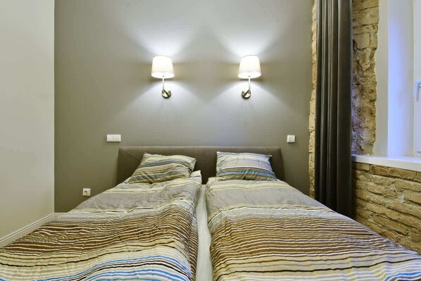 3 habitaciones, tabla de planchar con plancha, cuna de viaje y wifi