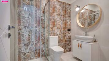 Shower, free toiletries, hair dryer, towels