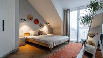 2 habitaciones, tabla de planchar con plancha, cuna de viaje y wifi