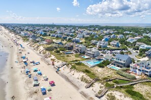 Exterior - 7BR house with pickleball lines & net (Corolla)