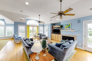 Télévision, cheminée, baby-foot