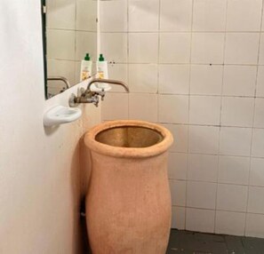 Shower, towels, soap, toilet paper