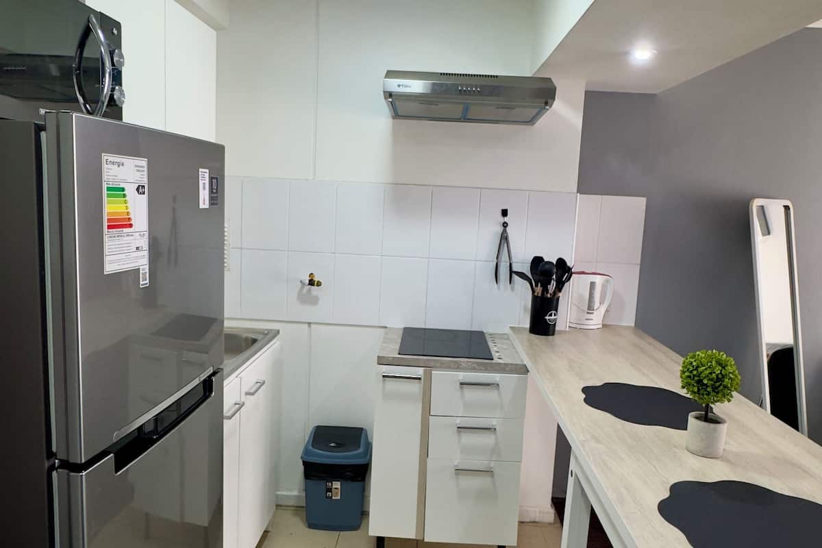 Apartment | Private kitchen | Microwave, oven, stovetop, cookware/dishes/utensils