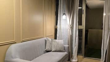 Apartment, 1 Doppelbett und Schlafsofa, Gartenblick | Wohnbereich