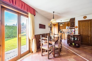 Apartment (2 Bedrooms) | Living area | 32-inch Smart TV with cable channels