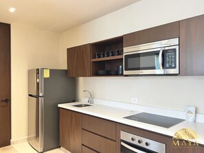 Fridge, microwave, coffee/tea maker, toaster