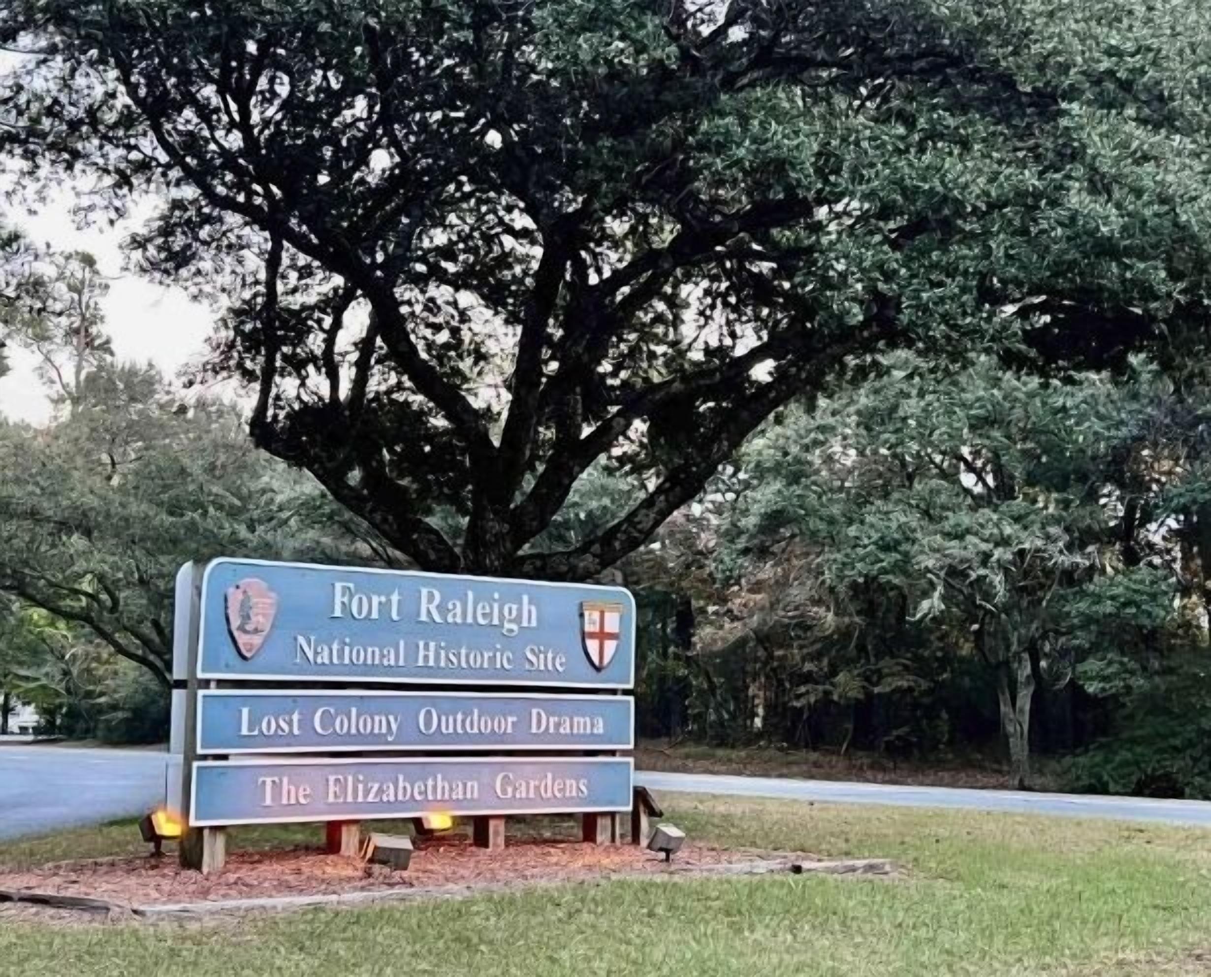 A sign for Fort Raleigh National Historic Site with attractions listed below.