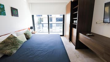 Departamento Confort | Caja de seguridad en la habitación y cortinas blackout