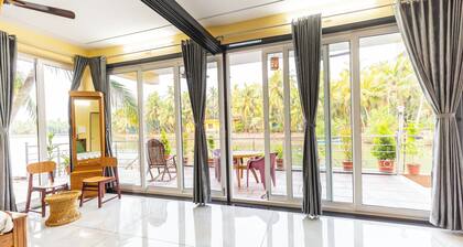 Riverside Retreat HomeStay – AC Studio with Breakfast Option & Boat Ride