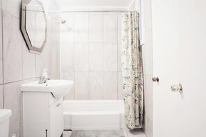 Hair dryer, towels, toilet paper