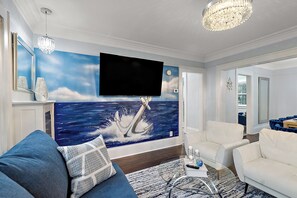 TV connectée, jeux vidéo, baby-foot, table de tennis de table