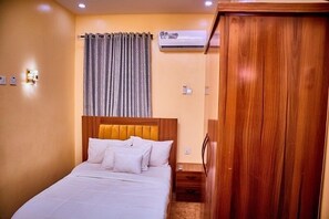 Comfort Apartment, Balcony, City View | Desk, laptop workspace, blackout drapes, soundproofing