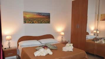 2 dormitorios, tabla de planchar con plancha, wifi gratis y ropa de cama