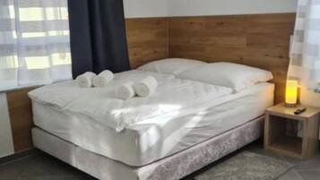 6 slaapkamers, een strijkplank/strijkijzer, wifi, beddengoed