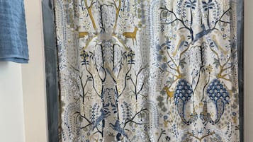 Shower, towels, soap, shampoo