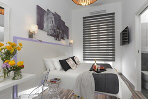 1 dormitori, planxa i posts de planxar, wifi i roba de llit