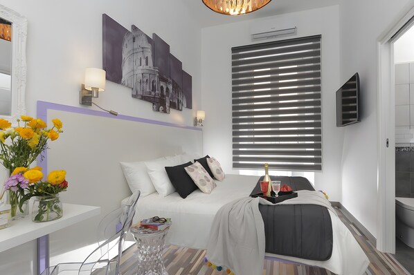 1 dormitorio, tabla de planchar con plancha, wifi y ropa de cama