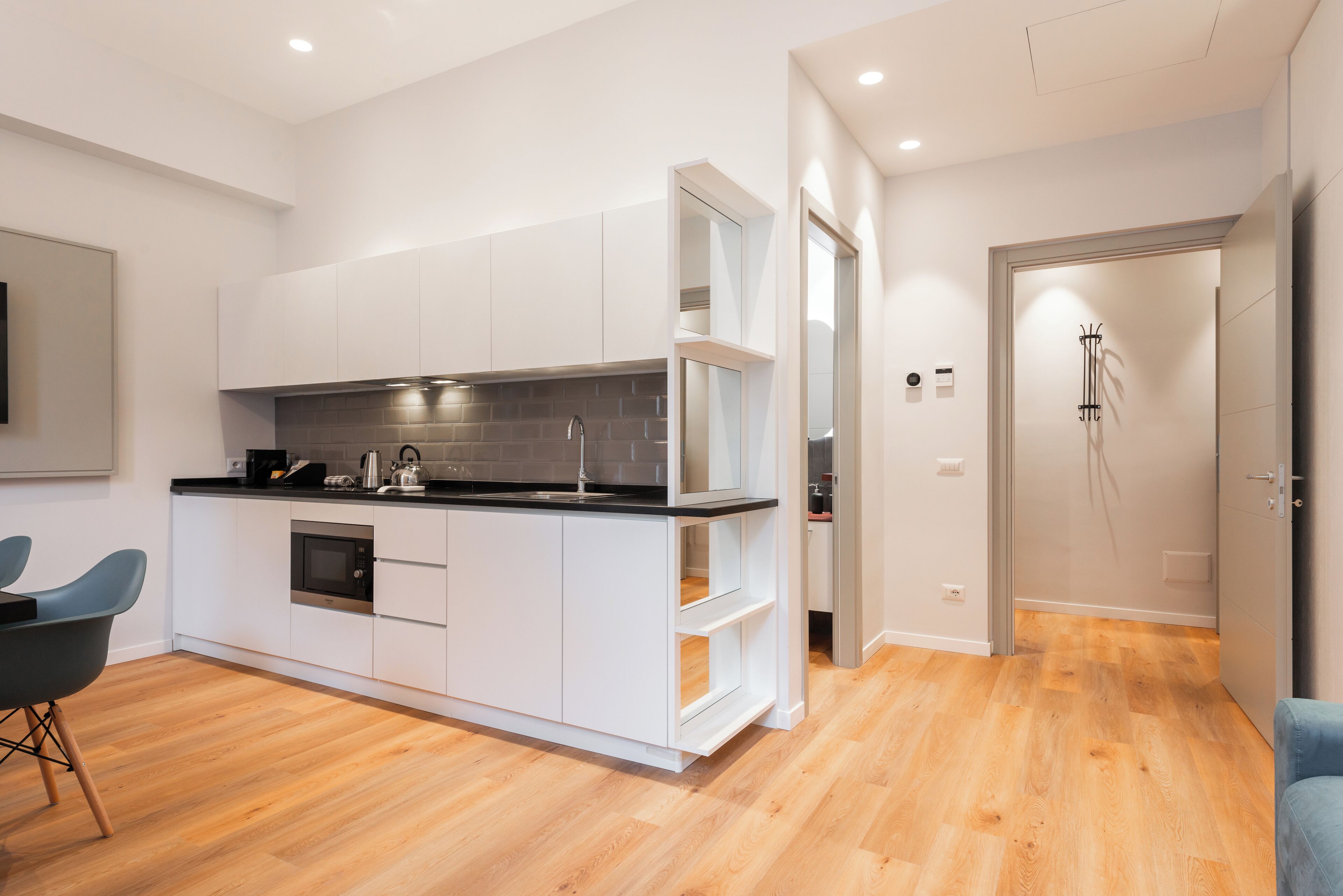 デラックス アパートメント コートヤードビュー | リビング エリア | テレビ