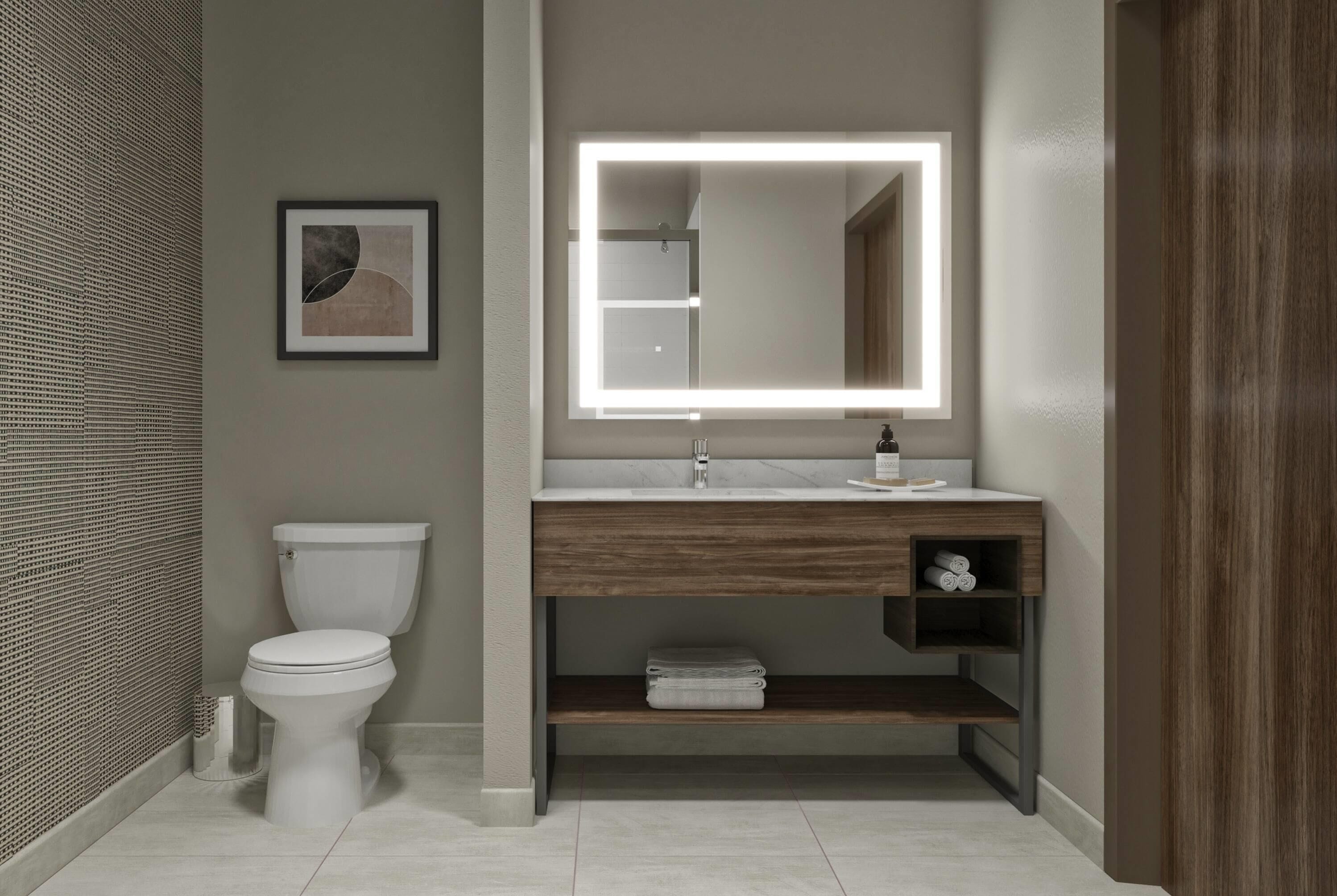 A modern bathroom with a toilet, a vanity with a mirror, and a shelf with towels.