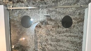Shower, towels, soap, toilet paper - Dome shaped bungalow in a lush tropical forest, steps away from ocean views. (Bocas del Toro)