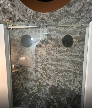 Shower, towels, soap, toilet paper