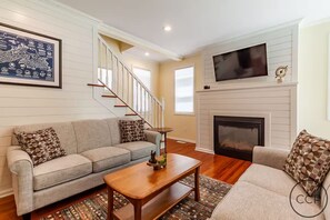 Smart TV, fireplace, DVD player, books