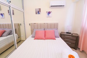 2 bedrooms, in-room safe, iron/ironing board, travel cot