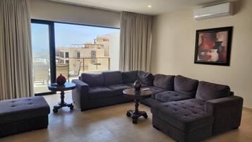 Casa familiar, vista al océano | Área de sala de estar